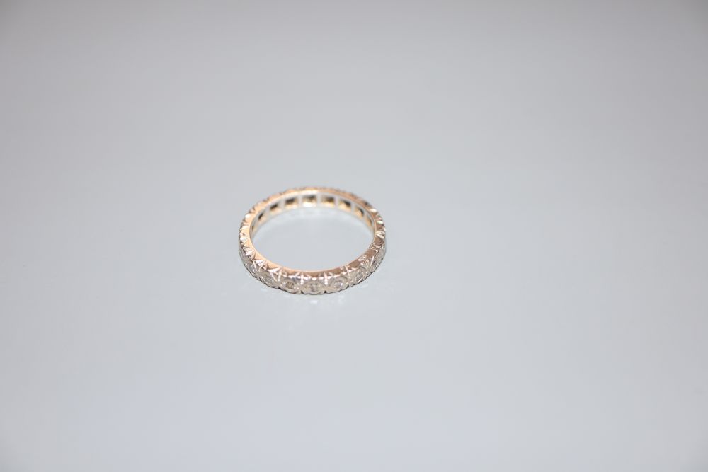 A modern 18ct white gold and diamond set full eternity ring, size M, gross 3.5 grams.